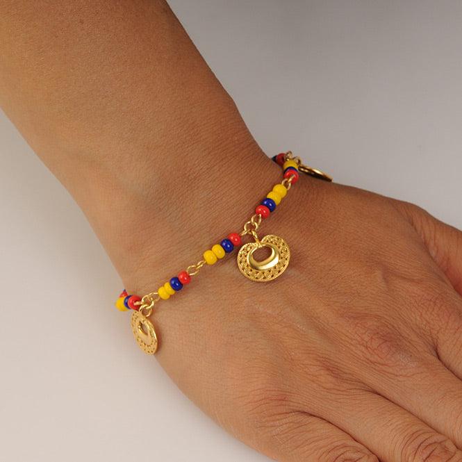 PULSERA COLOMBIA CON 3 DIJES MINI NARIGERA DE CIRCULOS TAIRONA - Blumart