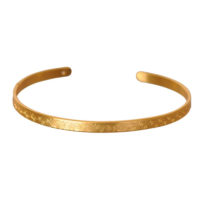 Brazalete delgado espirales dorado