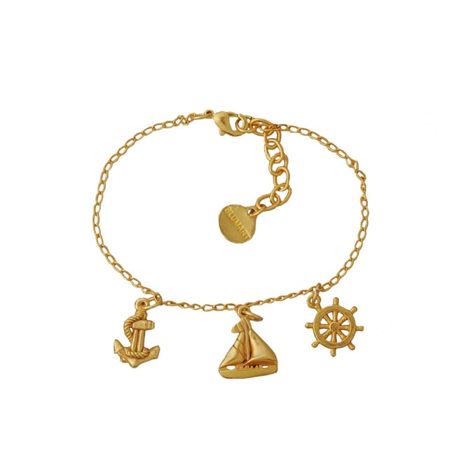 Pulsera colombiana con dijes de barco y mar.
Joya hecha a mano inspirada en el Caribe colombiano.